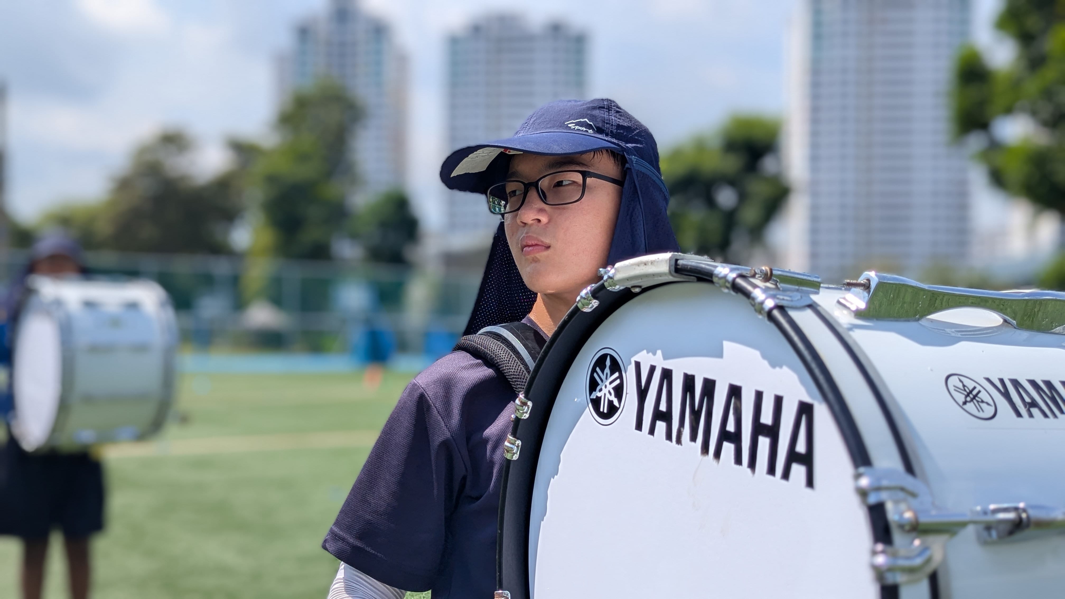 Boy playing drum.